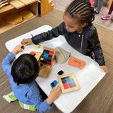 Miniapple International Montessori School Photo - Our mixed-age 33 month to 6 year old preschool classroom allows children to learn from and help each other in a family environment. Our curriculum teaches children about practical life, mathematics, language, geography and cultural studies, science, art and sensorial topics